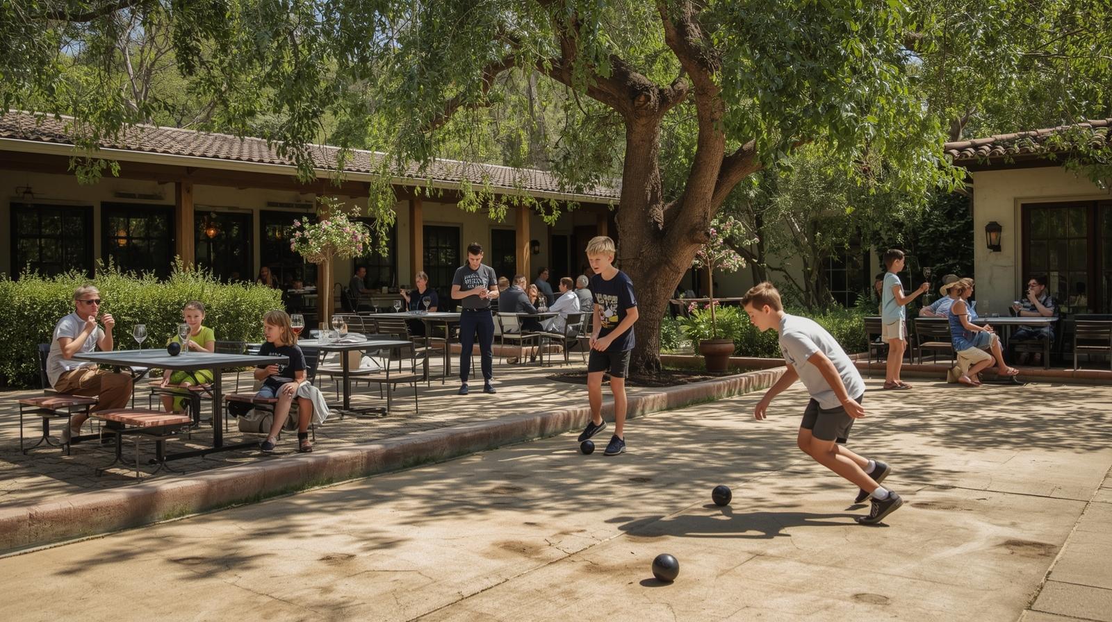 Children playing bocce in the courtyard at Travigne Pizzeria in St. Helena while families dine outdoors.